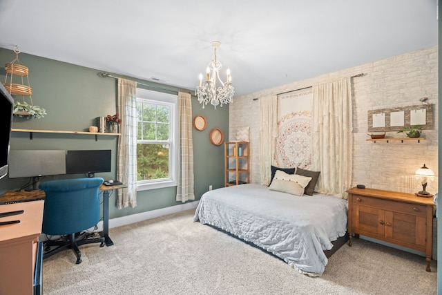 carpeted bedroom with a chandelier and brick wall