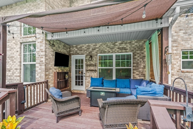 wooden deck featuring an outdoor living space