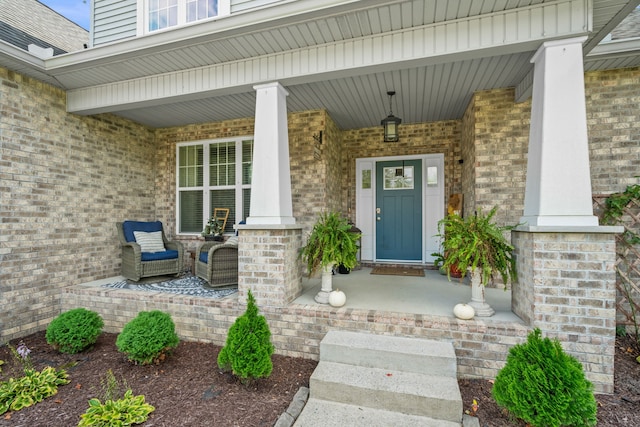 property entrance featuring covered porch