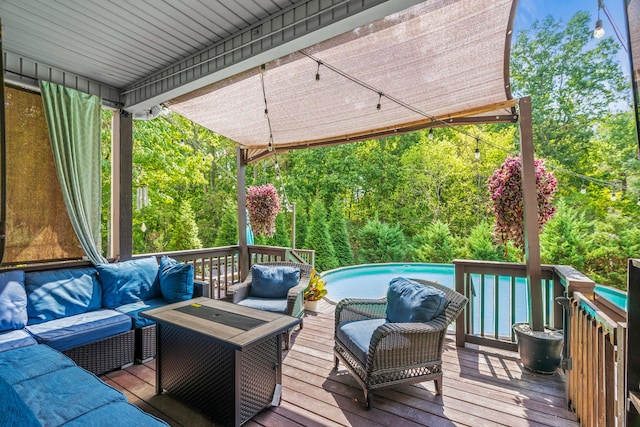 wooden deck featuring outdoor lounge area