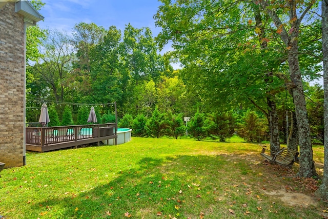 view of yard with a deck