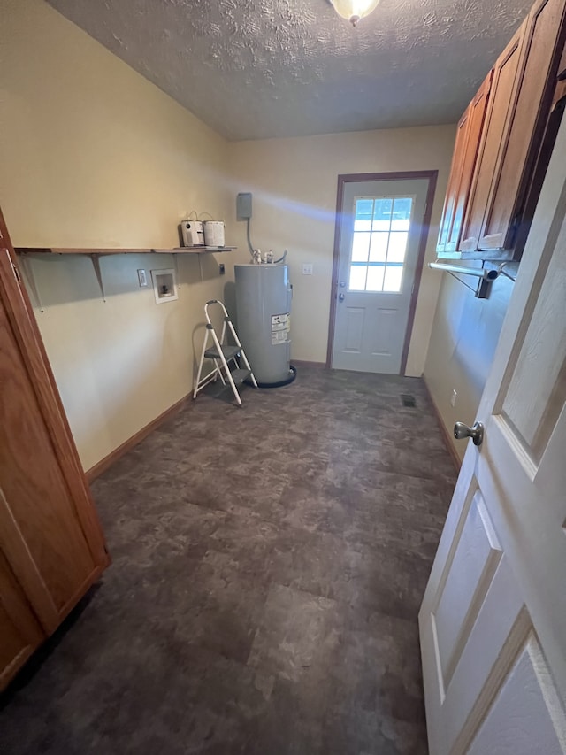 laundry room with hookup for a washing machine, electric water heater, a textured ceiling, electric dryer hookup, and cabinets