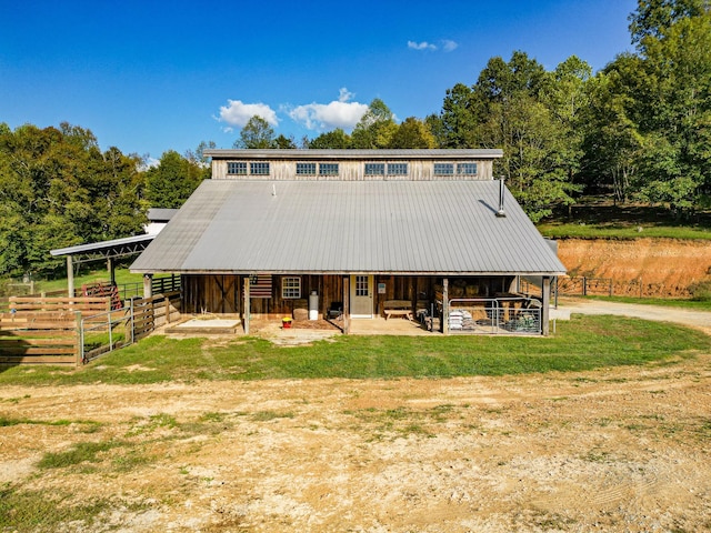144 Abberly Ln, Hohenwald, TN 38462 - view of front of home with an exterior structure, metal roof, and an outdoor structure