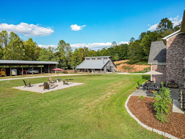 144 Abberly Ln, Hohenwald, TN 38462 - view of grassy yard featuring a carport