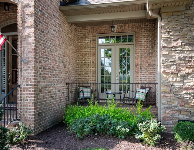 entrance to property featuring french doors