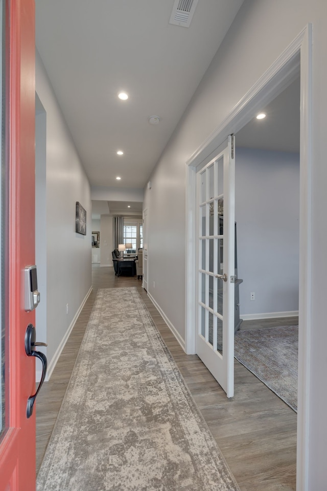 hallway featuring light hardwood / wood-style floors