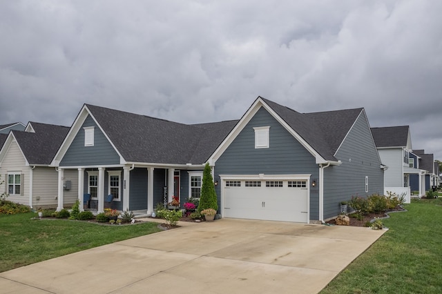 view of front facade featuring a front yard and a garage