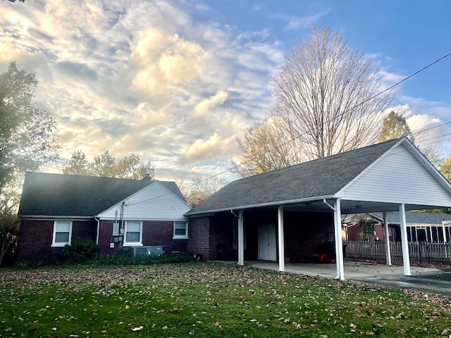 rear view of house with a yard