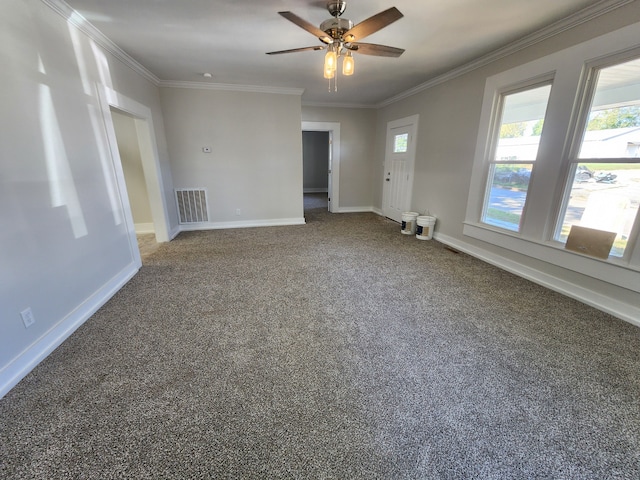 carpeted empty room with ceiling fan and ornamental molding