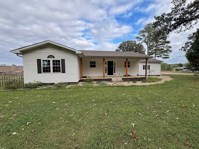 single story home featuring a front yard