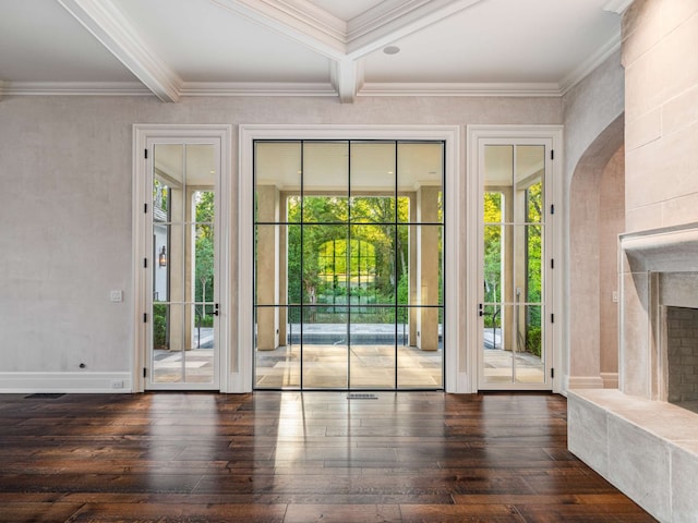 doorway to outside featuring ornamental molding, dark hardwood / wood-style floors, and beam ceiling