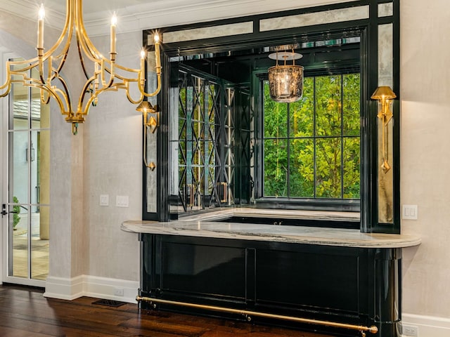 details featuring wood-type flooring and crown molding