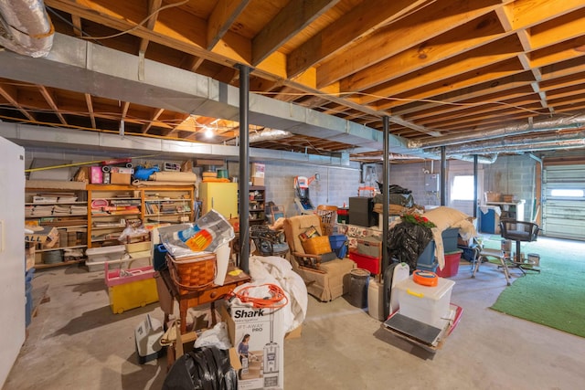 below grade area featuring concrete block wall