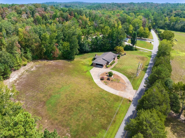 bird's eye view with a view of trees