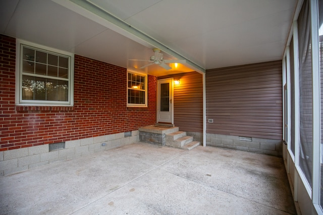 view of patio with ceiling fan