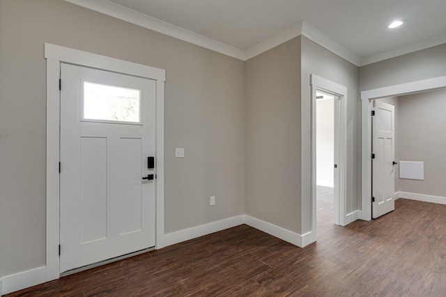 foyer entrance featuring crown molding, recessed lighting, dark wood finished floors, and baseboards