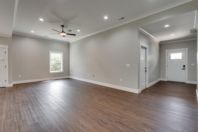 unfurnished living room featuring baseboards, ornamental molding, ceiling fan, and visible vents