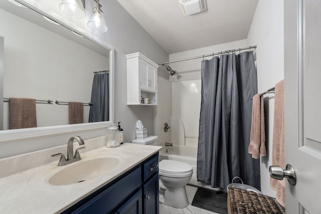 full bathroom with vanity, tile patterned flooring, toilet, and shower / bath combo