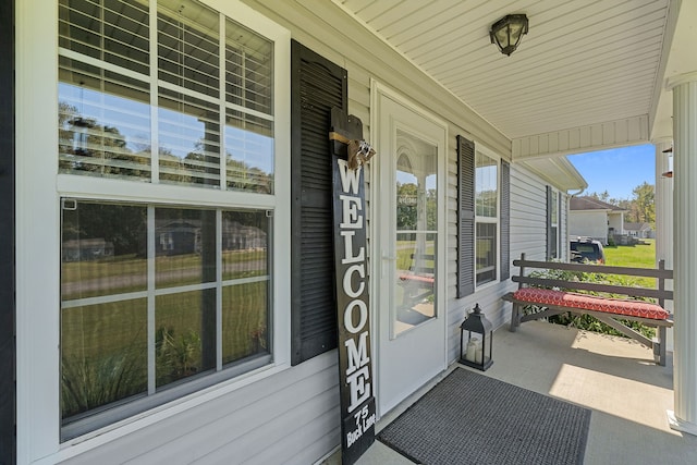 property entrance with a porch