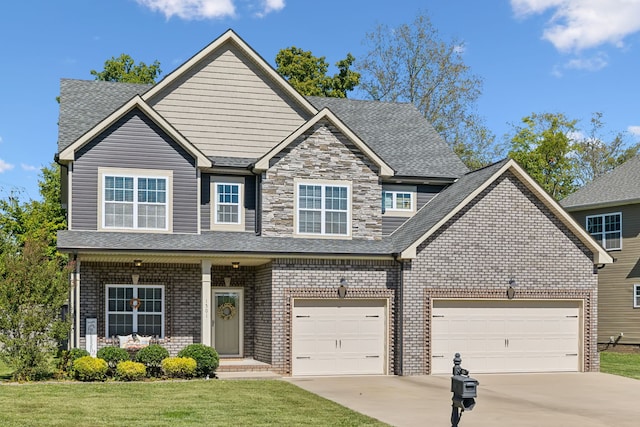 view of front facade with a garage and a front lawn