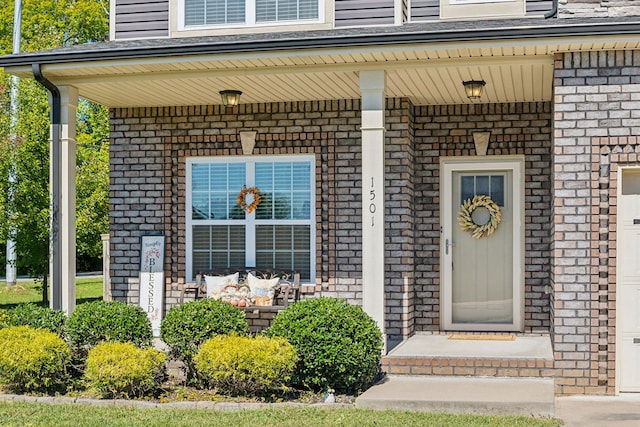 entrance to property with a porch