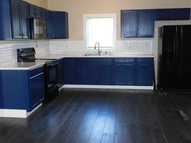 kitchen featuring black appliances, tasteful backsplash, sink, dark hardwood / wood-style flooring, and blue cabinets