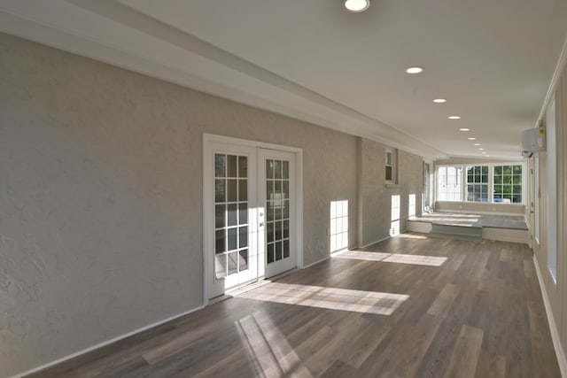 interior space with dark hardwood / wood-style floors and french doors