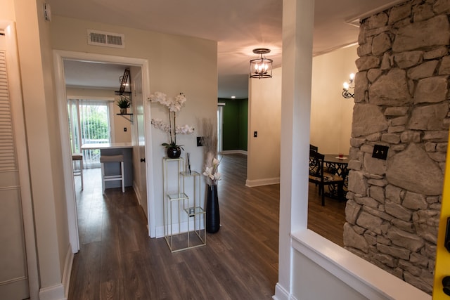 hallway featuring dark hardwood / wood-style floors