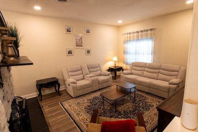 living room featuring dark hardwood / wood-style flooring