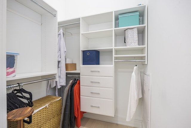 walk in closet featuring light wood-type flooring