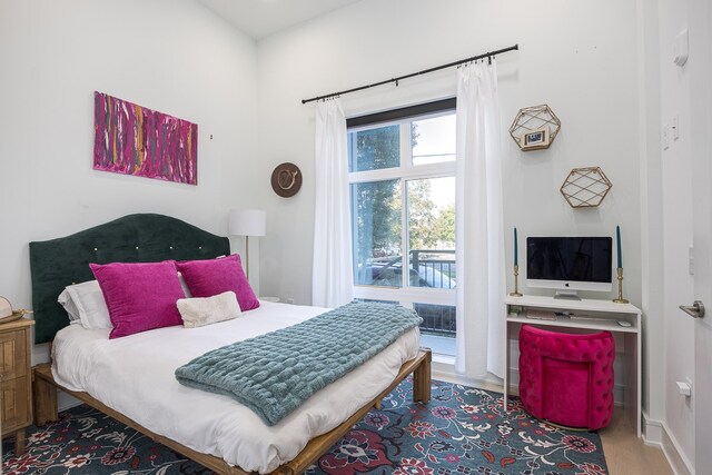 bedroom with light hardwood / wood-style flooring