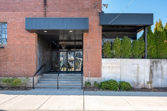 entrance to property featuring french doors