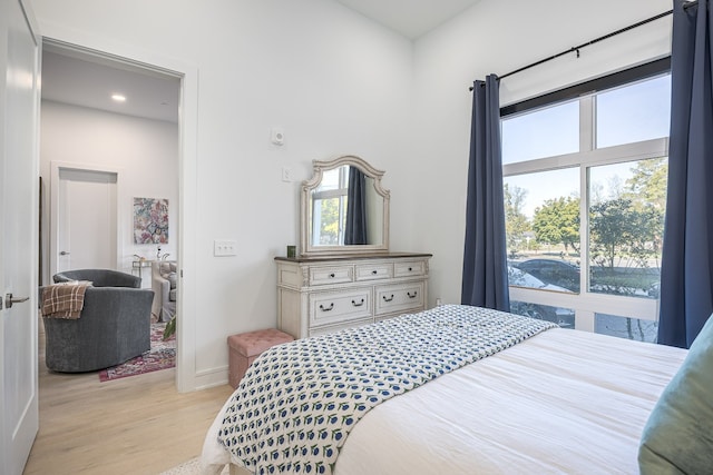 bedroom with light hardwood / wood-style flooring