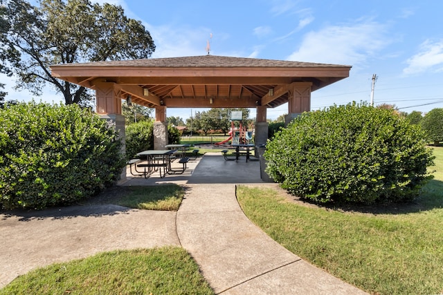 view of home's community featuring a gazebo, a lawn, and a patio