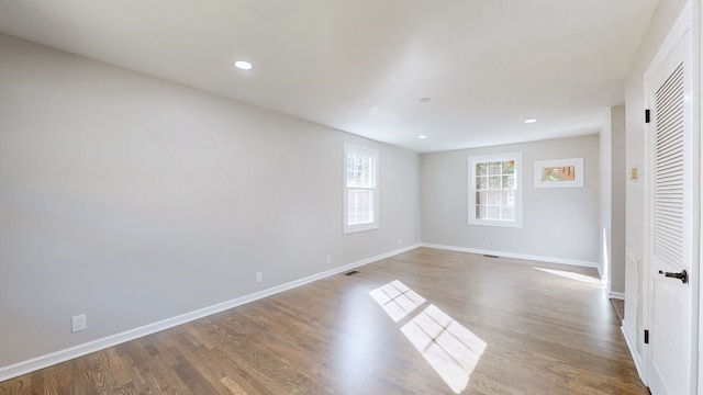 unfurnished bedroom featuring hardwood / wood-style floors