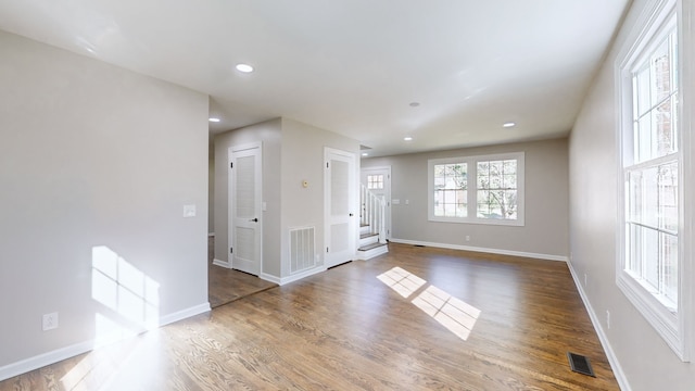 spare room featuring hardwood / wood-style flooring