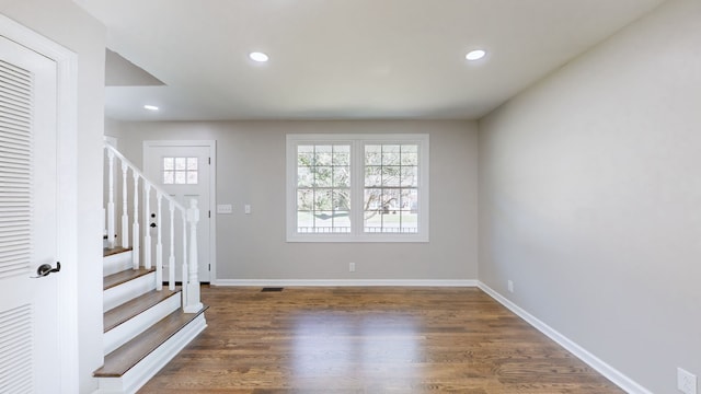 foyer featuring dark hardwood / wood-style floors