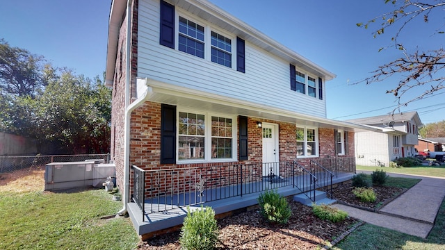 view of front of property featuring covered porch