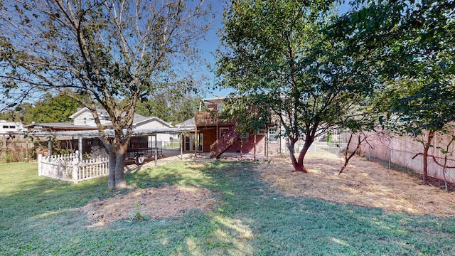 view of yard featuring a wooden deck