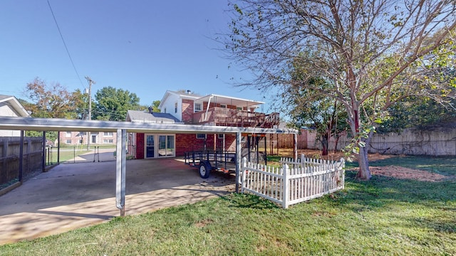 view of yard featuring a carport