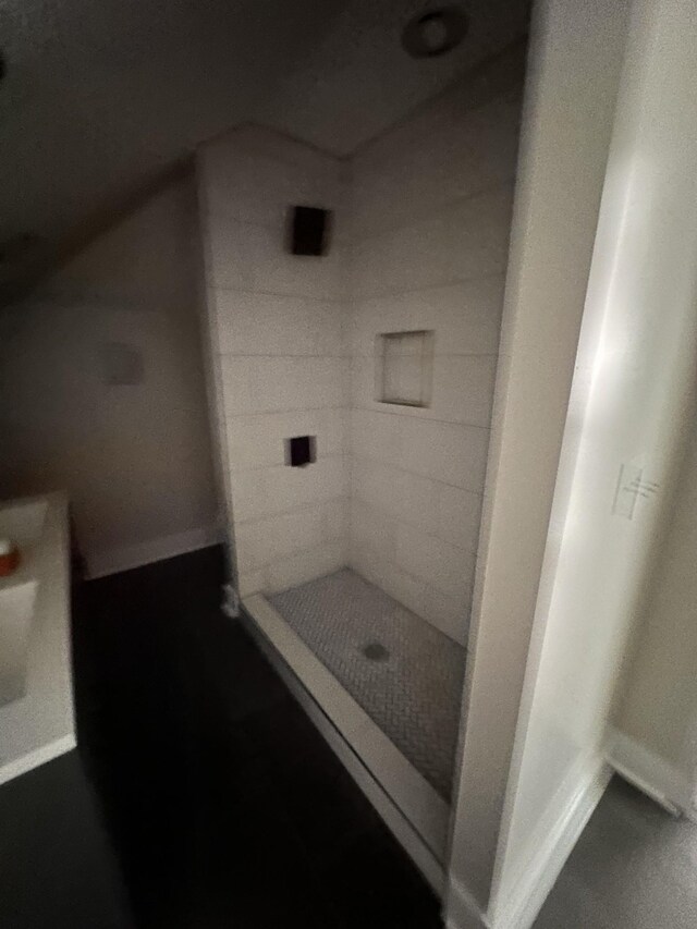 292 Quebeck Rd, Quebeck, TN 38579 - bathroom featuring a stall shower and baseboards