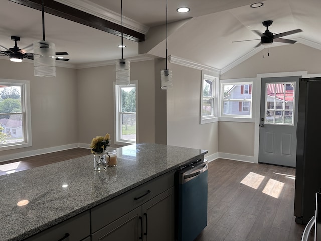 kitchen featuring lofted ceiling with beams, dark hardwood / wood-style flooring, refrigerator, light stone counters, and hanging light fixtures