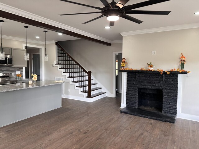 292 Quebeck Rd, Quebeck, TN 38579 - unfurnished living room with ornamental molding, dark wood-style floors, ceiling fan, and baseboards