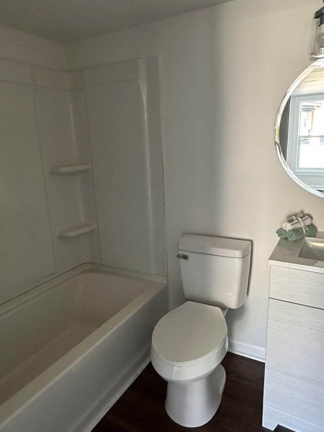 292 Quebeck Rd, Quebeck, TN 38579 - bathroom featuring toilet, vanity, wood finished floors, and baseboards