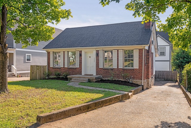 view of front of home with a front yard