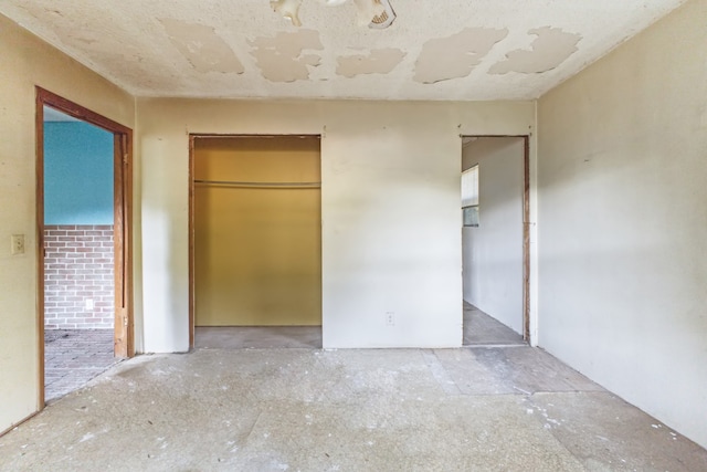 unfurnished bedroom with a closet