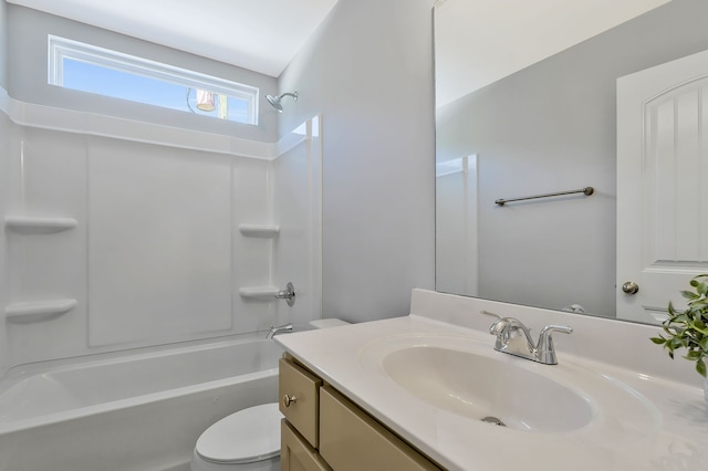 full bathroom featuring bathtub / shower combination, vanity, and toilet