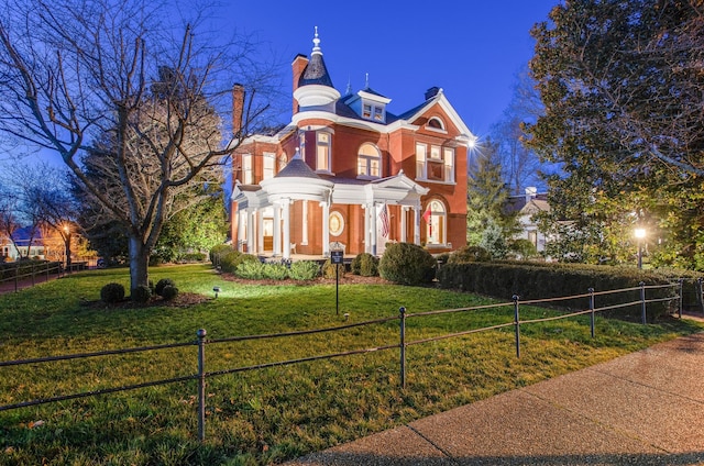 victorian house with a front lawn