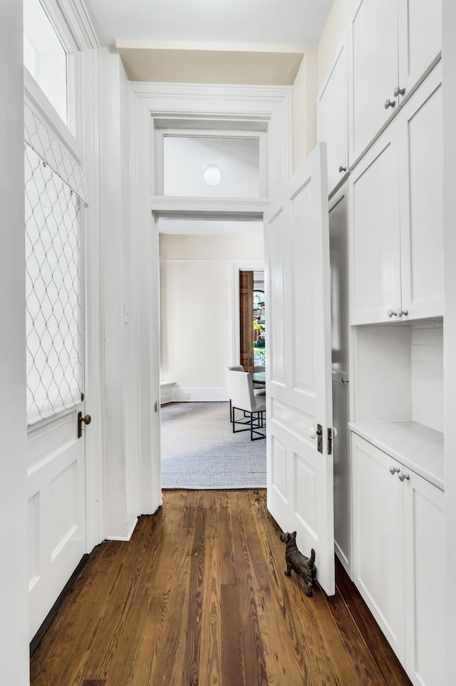 interior space with dark hardwood / wood-style flooring