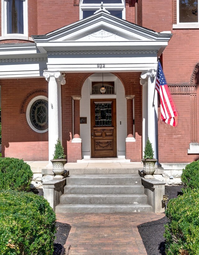 doorway to property featuring covered porch